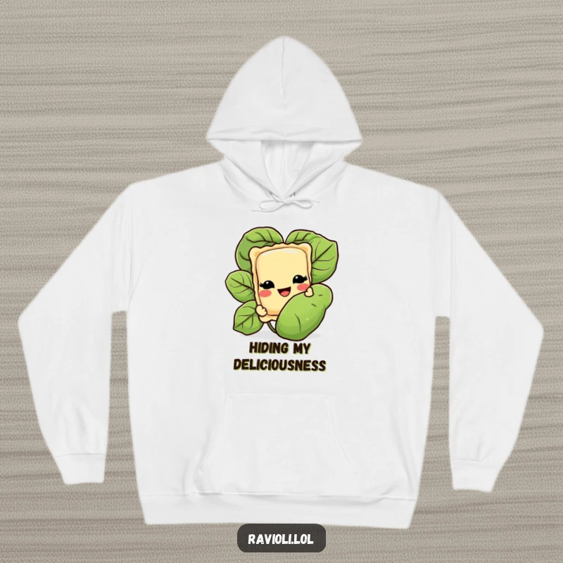 Funny hoodie design with a ravioli character grinning slyly while peeking from behind a prominent basil leaf, embodying a playful Italian food theme.